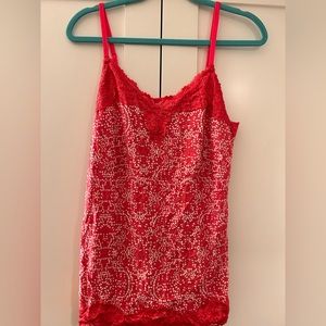 Lane Bryant polka dot tank top, lace trim. Looks red, but more of a coral.